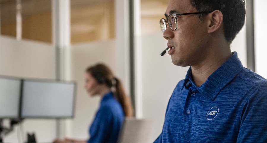 ADT professional in a monitoring center